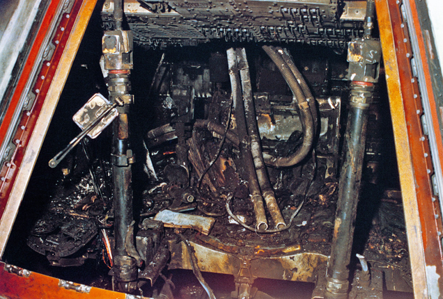 The fire-blackened remains of the interior of the Apollo 1 Command Module